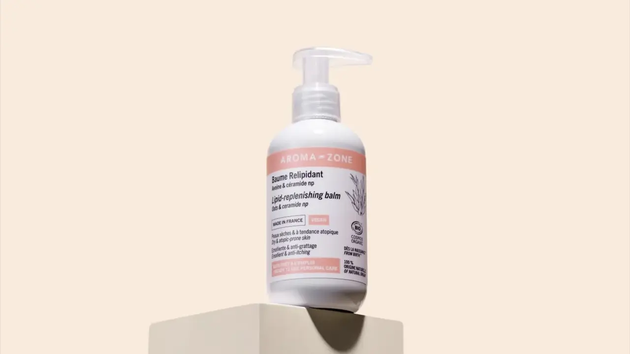 Flacon de baume relipidant Aroma-Zone, pour peaux sèches et atopiques. Sa formule est vegan et certifiée bio.
