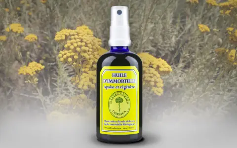 Flacon d'huile essentielle d'immortelle bio, idéale pour apaiser et régénérer la peau. Son utilisation est simple et efficace.