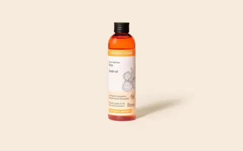 Bouteille d'huile de ricin Aroma-Zone, idéale pour fortifier cheveux, ongles et cils. Découvrez comment utiliser l'huile de ricin pour des résultats naturels.
