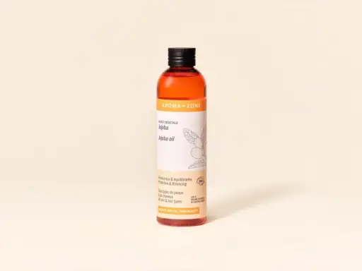 Flacon d'huile de jojoba Aroma-Zone, aux multiples bienfaits pour la peau et les cheveux.