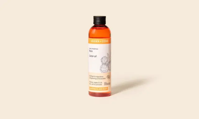 Bouteille d'huile de ricin Aroma-Zone, idéale pour fortifier cheveux, ongles et cils. Découvrez comment utiliser l'huile de ricin pour des résultats naturels.